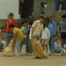 1986-1990. Steven Ekstrom 5th. Mr. Doug Elrich, 5th grade teacher supervises his class for field day activities. Center student is Steven Ekstrom.