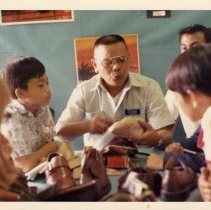 Color. 4.75x3.5. February 1973. "A shoemaker explains the need for a good last."