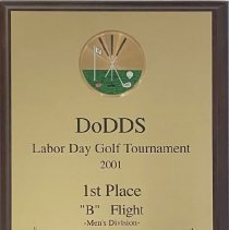 Plaque. Labor Day 2001. 1st Place B Flight. Men's Division and Labor Day 2003. Closest to the Pin Men's Division.

Yellow. "Give them the Paw"