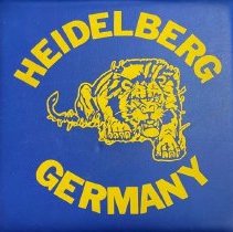Stadium Cushion. Heidelberg Germany. With scary mascot. Blue and gold.

Yellow. "Give them the Paw"