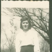 Cornelia Elmore standing on a sidewalk