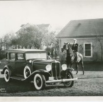 (188) 1931 Auburn 8-98 Sedan with Gentleman on Horse
