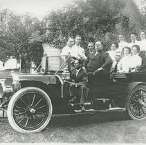 (61) 1910 Auburn Pictured with One Driver and Twelve Passengers, Male and F