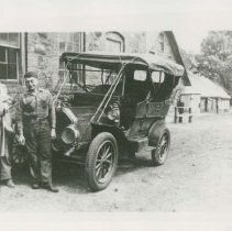 (67) 1910 Auburn Pictured in Front of Garage with One Man