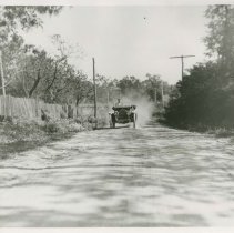 (81) 1911 Auburn Driving Down Country Road, Front View