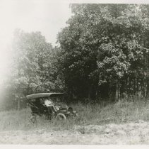 (82) 1911 Auburn Front Right 3/4 View, Driving Down Country Road