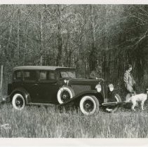 (505) 1931 Auburn 8-98 Sedan in Woodland, with Two Hunters and Dog
