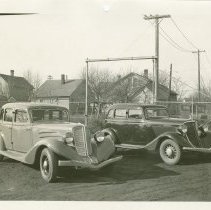 (608) 1934 Auburn Sedan with Studebaker Sedan, 3/4 Front Right Profile