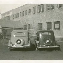 (609) 1934 Auburn Sedan with Studebaker Sedan, Rear View