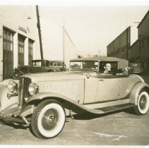 (616) James Cagney Seated in His 1934 Auburn 1250 Cabriolet