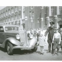 (644) 1934 Auburn Sedan Front Right 3/4 Profile with Policeman and Children