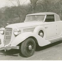 (700) 1935 Auburn 653 Cabriolet in Front of a Pont and an Elaborate Gate
