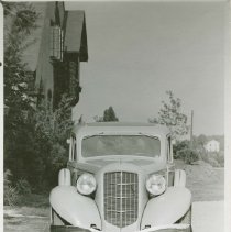 (704) 1935 Auburn 653 6 Sedan, Front View, Near a Church