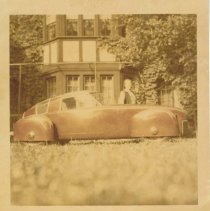 (957) 1948 Scale Model of a Four Passenger Coupe Protogype, Man Looking On