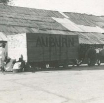 (127) Case Containing a 1930 Auburn 8-125 Sedan in Bombay, India