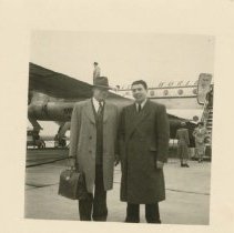 (143) Robert Wiley at an Airport in Belgium and Unidentified Man