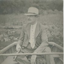 (91) Alan Leamy in a Row Boat with a Pistol