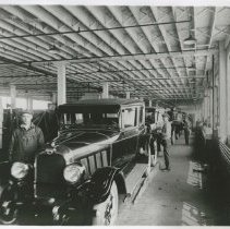 (276) AAC Employees Putting the Finishing Touches on Completed Auburns