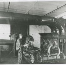 (277) AAC Employee at Work Welding on a Chassis