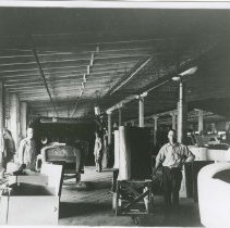 (280) AAC Employees Working on the Hood