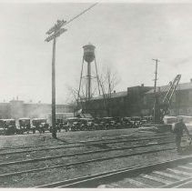 (381) Auburn Automobiles Parked Along the Railroad Tracks
