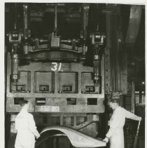 (430) 2 Connersville Plant Employees Working with the Fender Press