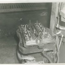 (483)  Shot of a Part for a Lycoming Engine Coming Out of the Cast