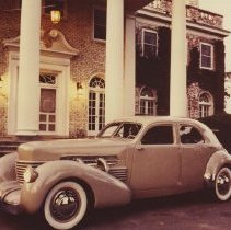 (439) 1937 Cord 812 Custom Beverley, in front of massive brick house