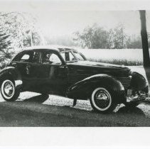 (485)1937 Cord 812 Beverly,3/4 front view right profile, in country setting