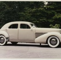 (495) 1937 Cord 812 Custom Beverly, right profile, woods behind