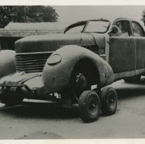 (496) 1937 Cord 812 Custom Beverly Sedan being towed after an accident