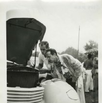(560) Judge Paul Bryant looking at a 1937 Cord 810 at the 1975 ACD Club