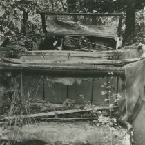 (16)1930 Duesenberg J-127/2152 Convertible Sedan, unrestored in the woods