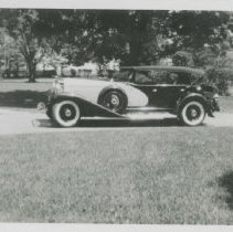(181)1934 Duesenberg J-482 LaGrande Phaeton in suburban setting