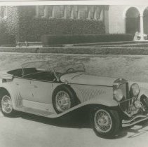 (228)1929 Duesenberg J Dual Cowl Phaeton at a church