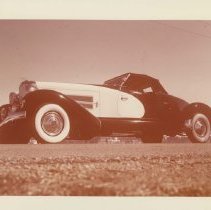 (24)1979 Duesenberg II replica of J-508E, upward looking shot on rural road