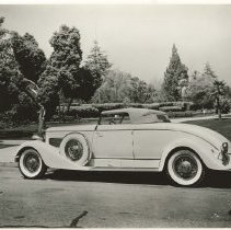 (420)1931 Duesenberg J Coupe, left profile, in a park setting