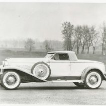 (459)1930 Duesenberg J-249 Car 2492 Speedster, left profile, tree line