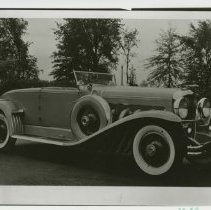 (560)1930 Duesenberg J Convertible Coupe, 3/4 front right view, in a park