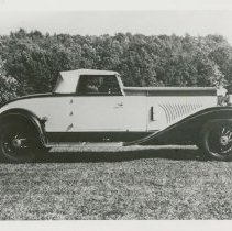 (561)1930 Duesenberg J Convertible Coupe, right profile, many trees behind