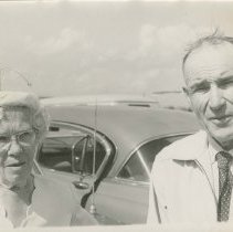 (647)Gertrude Duesenberg and Bob Crebrane, auto behind