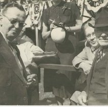 (684)Mr. and Mrs. August Duesenberg and Tommy Multon, at Indianapolis