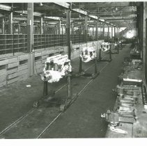 (769)Shot of Several Duesenberg Aviation engines on stands in factory