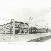 (788)1920 Duesenberg twin engine race car in front of Duesenberg Motors Co-