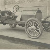 (1026)Shot of Mason around 1910 in front of a factory building