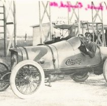 (1031)Crawford #2 race car with driver Dave Lewis and another passenger