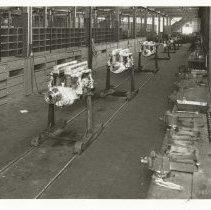 (1034)Shot of engines lined up on stands in the Duesenberg Motor works