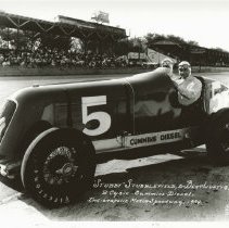 (1042)1934 Duesenberg #5 race car with a Cummins engine at the race track