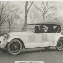 (1047)1931 Duesenberg J Derham convertible Sedan with a building behind
