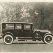 (1061)1924 Duesenberg A Limousine in heavily tree-lined setting